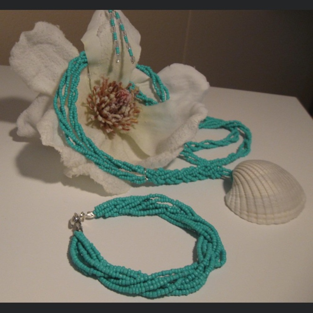 Necklace, earrings, and bracelet